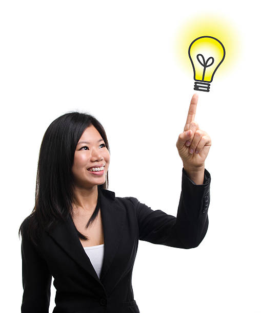 Light bulb idea Southeast Asian woman hand pointing at  light bulb idea over white background hot filipina women stock pictures, royalty-free photos & images