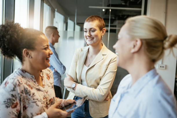 istock Businesswomen working in team in modern corporate office 1640116533