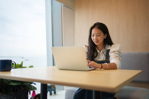 istock beautiful woman browsing the internet 1640142309