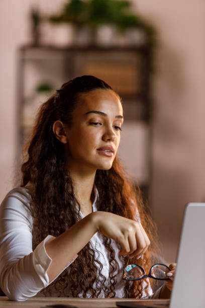 istock Woman working on laptop at the office 1640143382