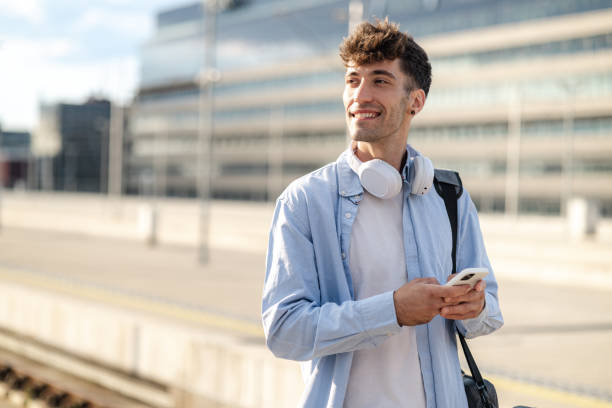 istock Portrait of a young man using phone 1640143966