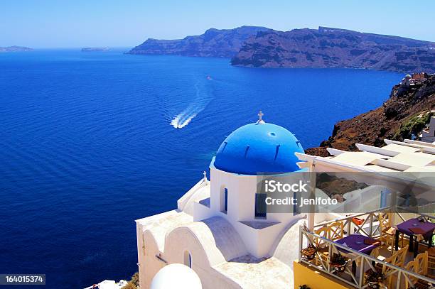 Blue And White Church With Boat Oia Santorini Greece Stock Photo - Download Image Now