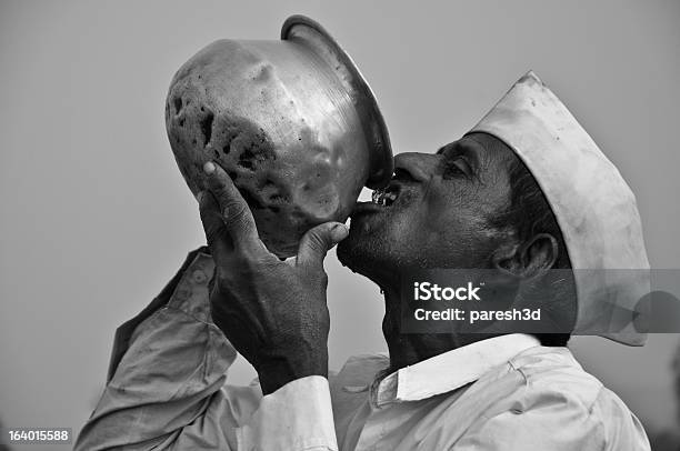 Indian Man Drinking Water Stock Photo - Download Image Now - Farmer, Drinking, India