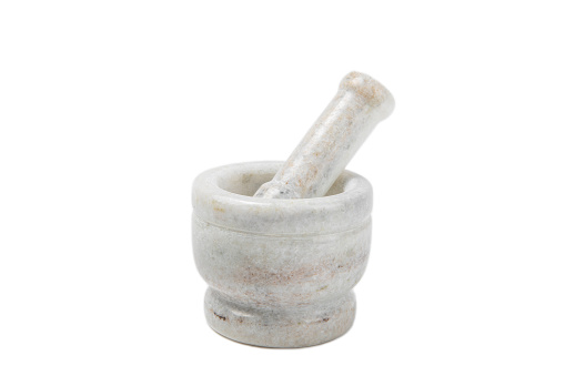 Mortar and pestle isolated on white background. Siupka for grinding spices, herbs and cooking.