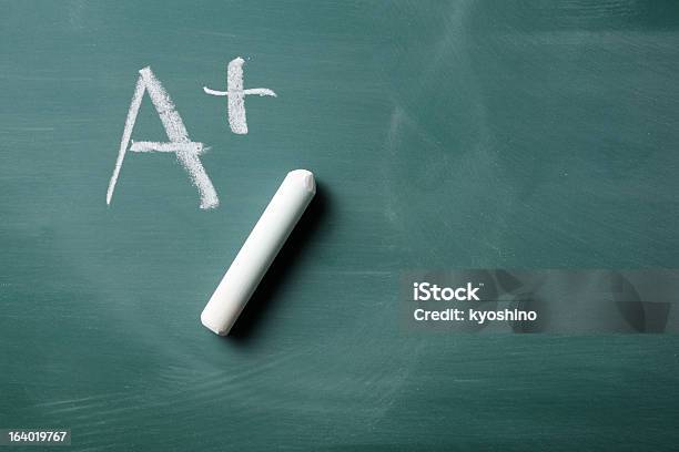 Grade A On Blackboard With Copy Space Stock Photo - Download Image Now - Chalk - Art Equipment, Report Card, Chalk Drawing