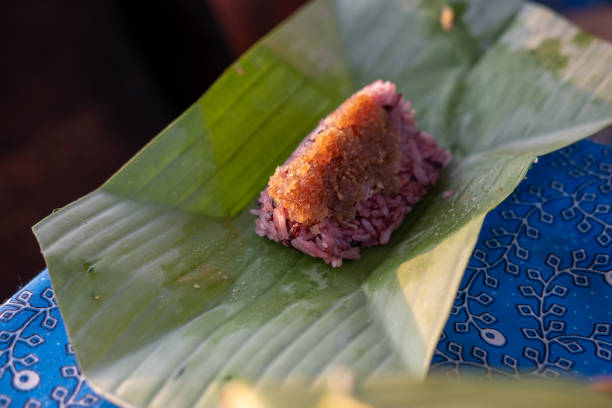 istock Black sticky rice, served on banana leaf 1640258541