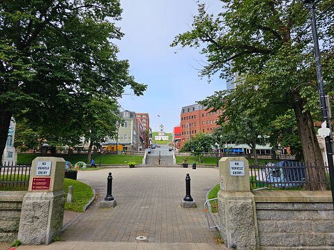 Halifax, NS, CAN, 8.13.2023 - A park entrance toward a street in down town Halifax, Nova Scotia.