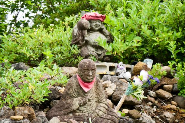istock Jizo watching over everyone in the mountains 1640283495