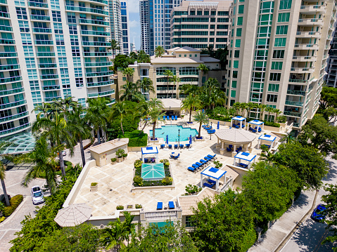 Fort Lauderdale, FL, USA - August 25, 2023: Aerial photo of a residential condominium with  pool terrace