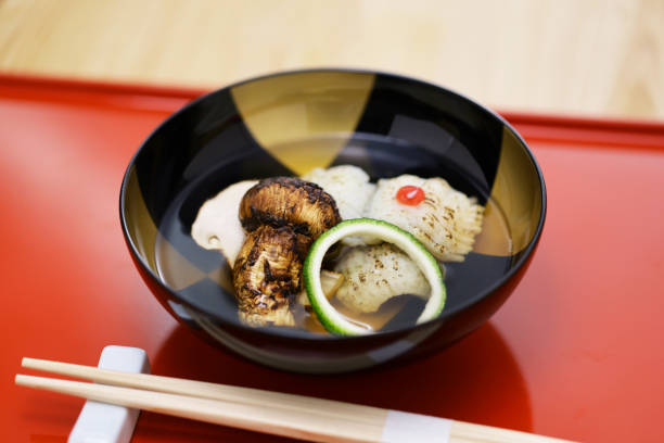 Clear soup with matsutake mushroom and pike conger eel. Japanese traditional cuisine.
