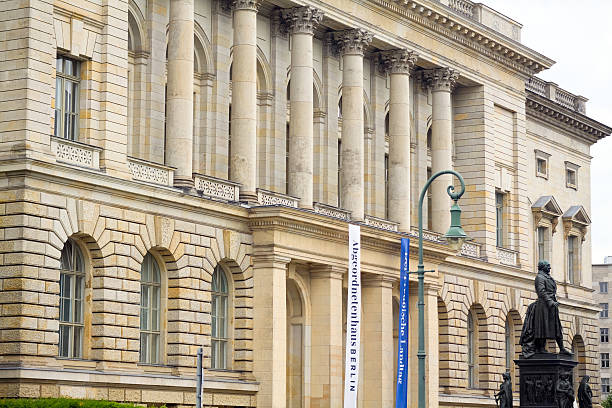 Abgeordnetenhaus von Berlin is the state parliament for the German state of Berlin according to the state's constitution. This is main facade over enttrance with its columns and windows. Building is former Prussian parliament. In front of building is statue of Freiherr vom Stein. Monument and statue of Heinrich Friedrich Karl Reichsfreiherr vom und zum Stein is manufactured by F. A. Hermann Schievelbein (1817 - 1867) and placed for publicity in 1875. In former days it stood at Dönhoffplatz.