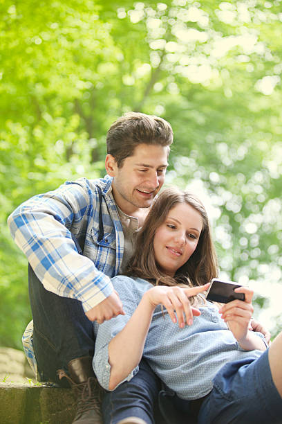 istock couple with phone 164029024