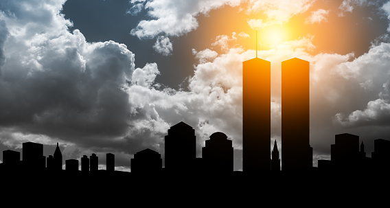 New York skyline silhouette with Twin Towers at sunset. 09.11.2001 American Patriot Day banner.