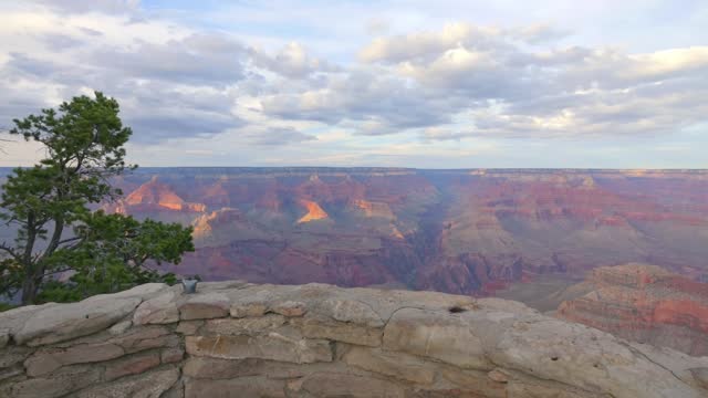 Aerial view of the Grand Canyon with dynamic sky in 4k slow motion 60fps
