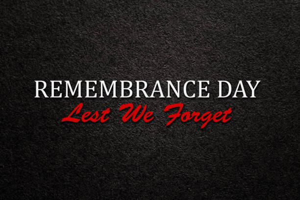 istock Text Remembrance Day Lest We Forget on black textured background. Remembrance Day, Memorial Day. 1640311189