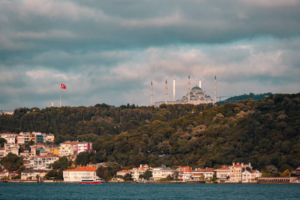 Camlica mosque, ferry and Bosphorus view taken from the sea. A huge Istanbul article written on Camlica hill. Camlica mosque, ferry and Bosphorus view taken from the sea. A huge Istanbul article written on Camlica hill. bogaz stock pictures, royalty-free photos & images