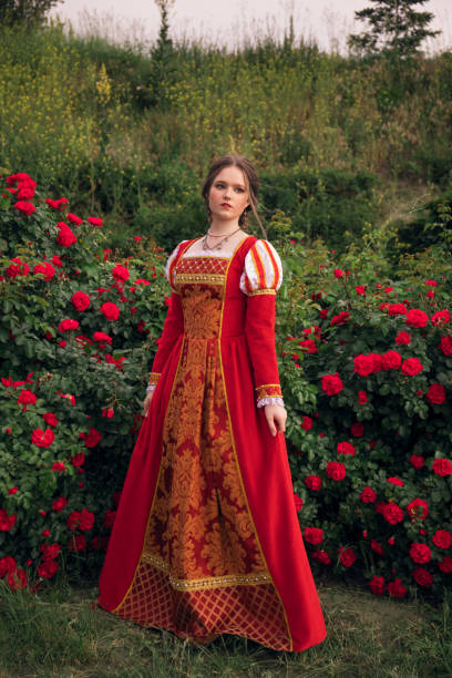 istock Medieval princess in rose garden 1640397227