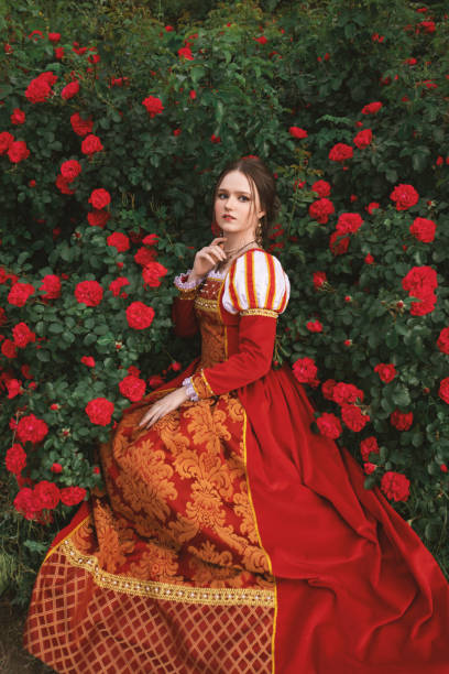 istock Medieval princess in rose garden 1640397238