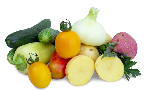 Bunch of different fresh vegetables isolated on white background.