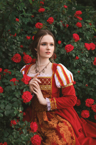 istock Medieval princess in rose garden 1640397243