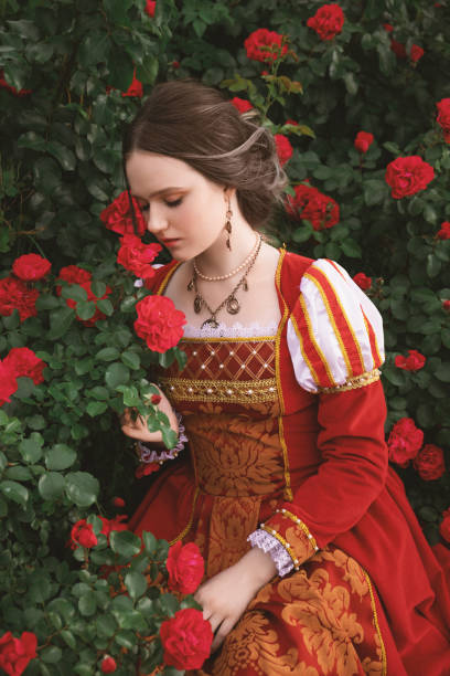 istock Medieval princess in rose garden 1640397421