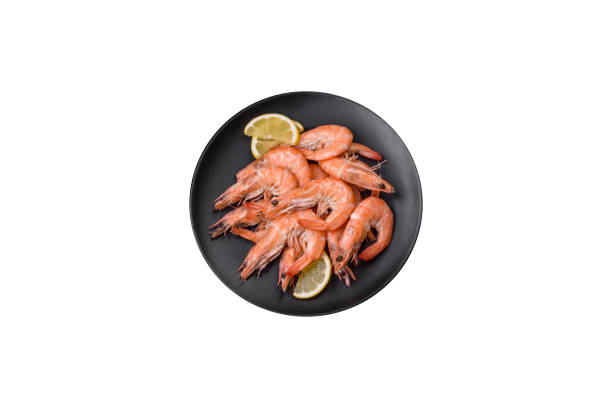 istock Tiger shrimp or langoustine boiled with spices and salt 1640404268