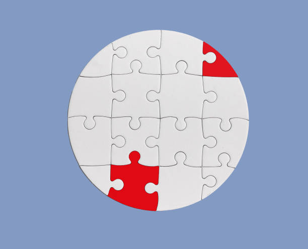 istock The missing link. Connecting the jigsaw pieces to form the whole picture. 1640426861