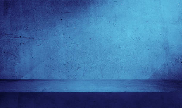 istock minimal abstract blue concrete background with light for product presentation. shadow and light from windows on cyan rustic plaster wall. blue studio backdrop. dramatic, blue modulations. 1640433261