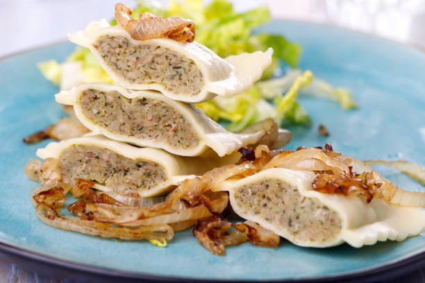 halves of swabian maultaschen pasta with salad