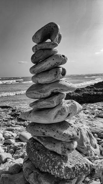 istock Stacked up stones at the beach 1640451605