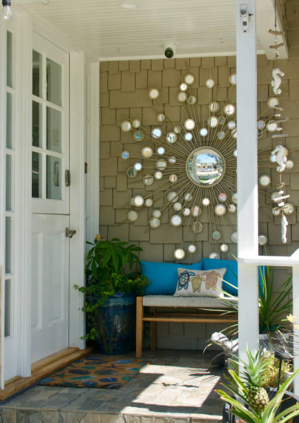 istock Cute cottage with charming decor on the front porch 1640451625