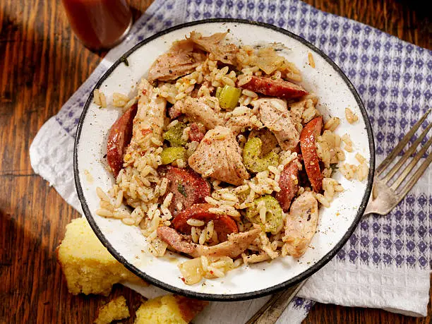 Cajun Style Chicken and Sausage Jambalaya with Hot sauce and corn bread- Photographed on Hasselblad H3D2-39mb Camera