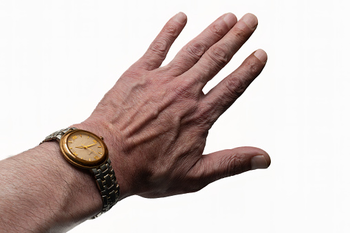 Man's hand with roman numerals clock
