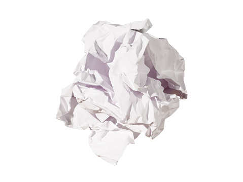 A ball of crumpled paper as a concept of a business idea, project or startup isolated on a white background