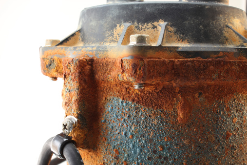 Close up of an old rusty sump pump