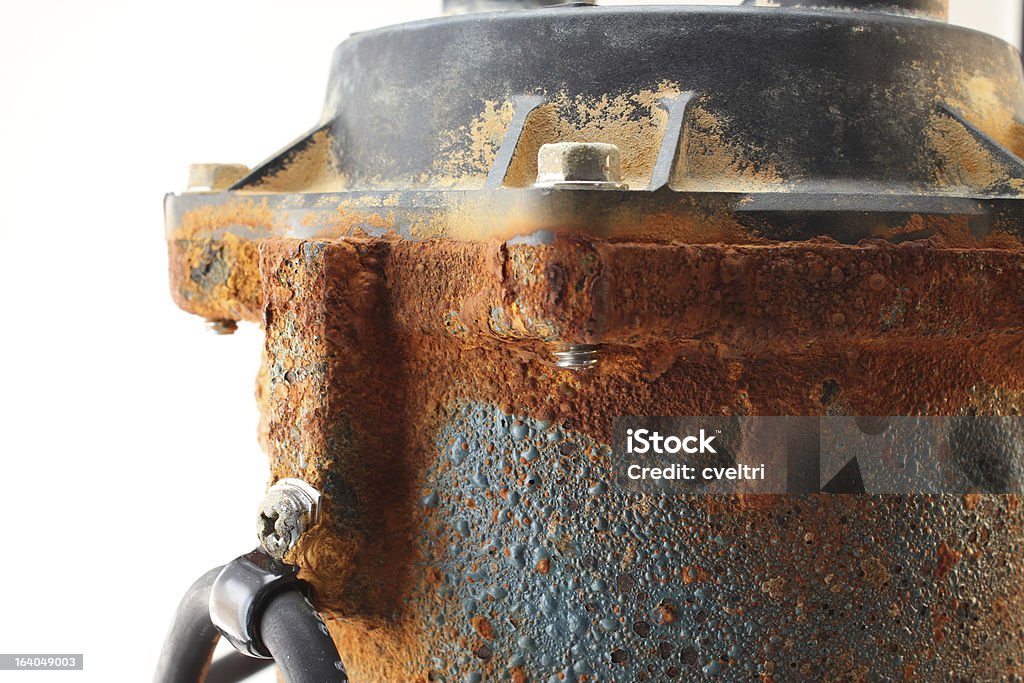 Old Rusty Sump Pump Close up of an old rusty sump pump Water Pump Stock Photo