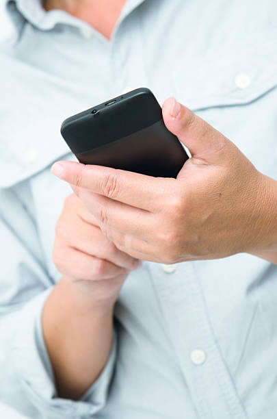 istock Checking the email with a contemporary Smart Phone 164049225