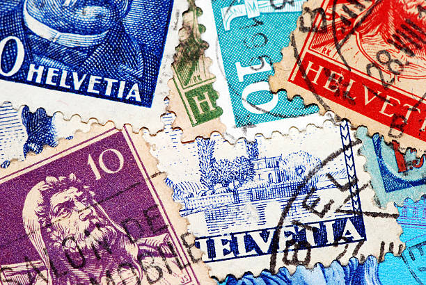 macro fotografía colección de sellos antiguos de envío suiza - postage stamp switzerland swiss culture swiss currency fotografías e imágenes de stock