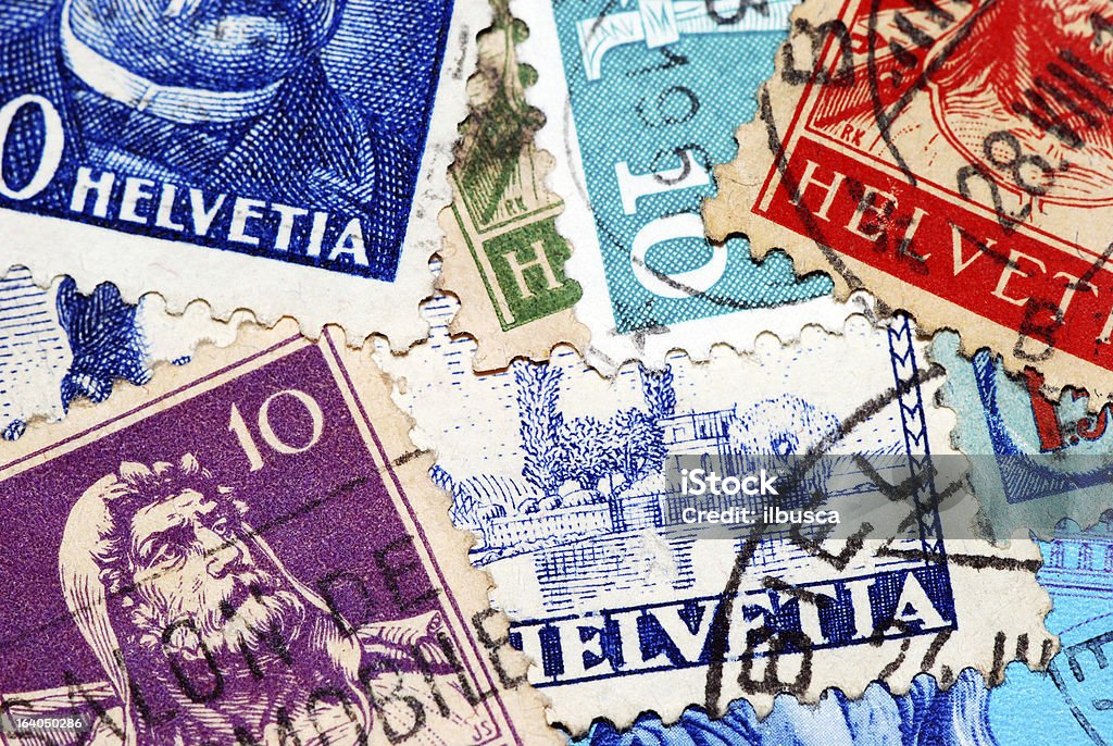 Макро Фотография коллекция старинных почтовых марок Swiss - Стоковые фото Почтовая марка роялти-фри