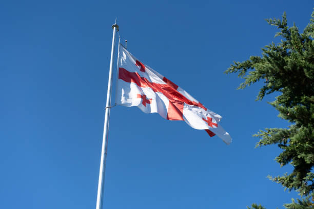 Georgian flag flutters in the wind on a sunny day