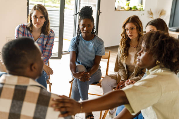 istock Young man talking about his mental health struggles during a group therapy session 1640535434