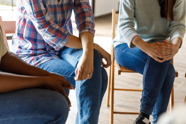 istock Body language of diverse young people during a group therapy session 1640535440