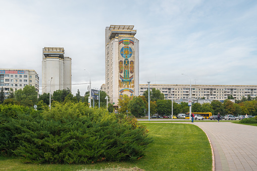 Minsk, Belarus - Jul 31, 2019: Soviet Era Buildings with City Builder Mosaic by Alexander Kishchenko - Minsk, Belarus