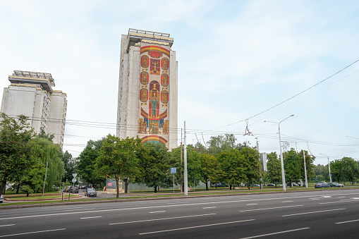 Minsk, Belarus - Aug 02, 2019: Soviet Era Buildings with City of Heroes Mosaic by Alexander Kishchenko - Minsk, Belarus