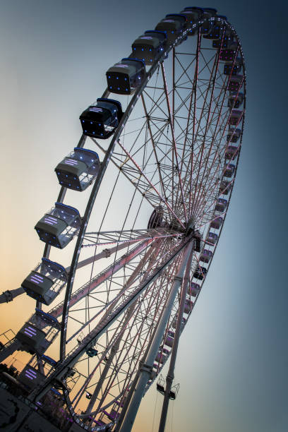 istock big wheelw amusement park in the evening 1640547066