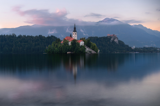 Located in the beautiful mountain lake of Bled in Slovenia
One finds this wonderful church completely isolated from the mainland 
The lake is surrounded by dense forest, and its waters are deep enough that you need a small boat to reach lysolotto or you can get there by swimming