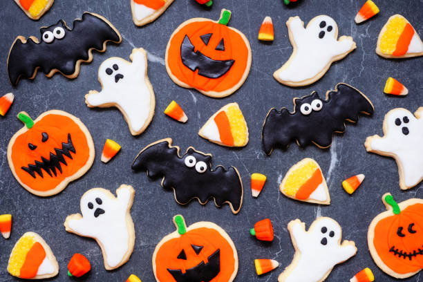 istock Halloween cookie background on dark stone 1640580592