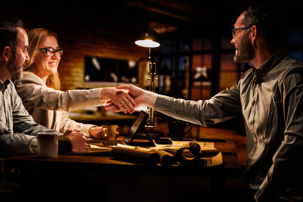 istock Business people shaking hands after a successful meeting 1640594241
