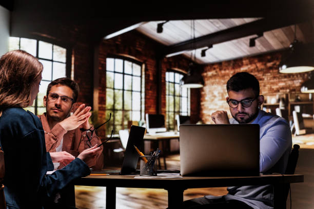 istock Entrepreneurs sharing their input for a project they are co-working on 1640602280