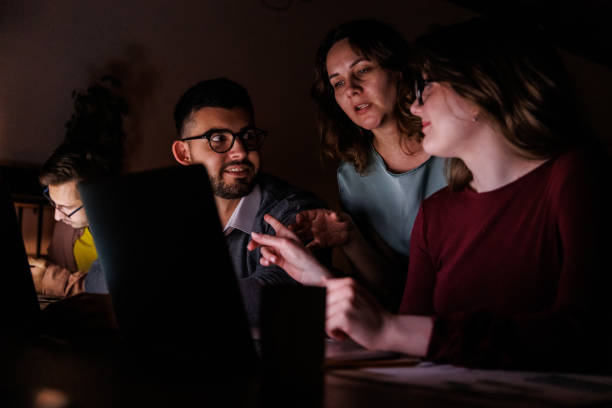 istock Colleagues analyzing data on laptop screen and discussing strategies 1640609220